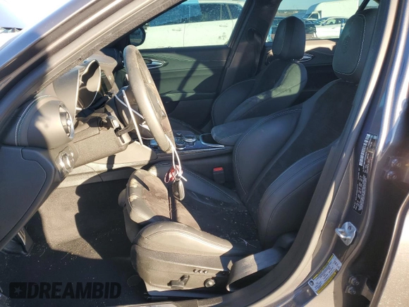 2021 Alfa Romeo Giulia Quadrifoglio with VIN ZARFAMEV2M7646078, listed as a Copart auction lot 82237543 with Not provided miles and . Bid and sale history available at DreamBid. Image 7.