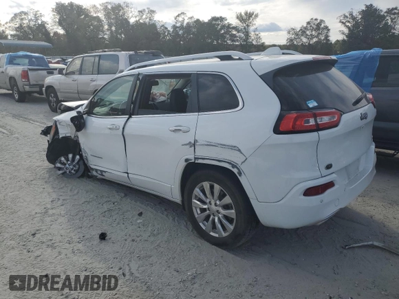 2018 Jeep Cherokee Overland with VIN 1C4PJMJX9JD594323, listed as a Copart auction lot 76238794 with 71,870 mi miles and Salvage Title. Bid and sale history available at carsss.com. Image 2.