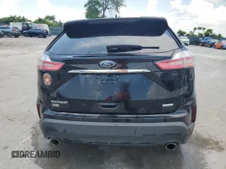 2020 Ford Edge SE z VIN 2FMPK3G97LBA34093, wystawiony jako Copart lot #61878085 z przebiegiem Nie podano mil oraz Szkoda całkowita • Salvage title. Historia ofert i sprzedaży dostępna na DreamBid. Obrazek 6.