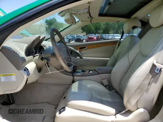 2006 Mercedes-Benz SL 500 with VIN WDBSK75F06F109541, listed as a Copart auction lot 61430545 with 106,428 mi miles and Salvage title. Bid and sale history available at DreamBid. Image 7.
