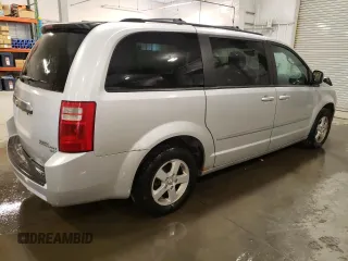 2010 Dodge Grand Caravan SXT with VIN 2D4RN5D19AR409665, listed as a Copart auction lot 46676445 with 174,063 mi miles and Salvage Title. Bid and sale history available at DreamBid. Image 3.
