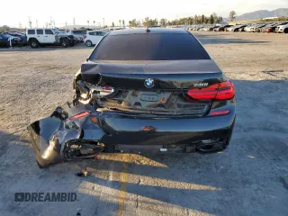 2017 BMW 7 Series 740i with VIN WBA7E2C38HG741255, listed as a Copart auction lot 39926213 with 76,321 mi miles. Bid and sale history available at carsss.com. Image 6.