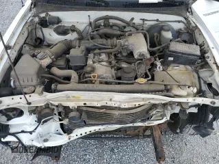 2002 Toyota Tacoma z VIN 5TENL42N22Z113383, wystawiony jako Copart lot #59007905 z przebiegiem 167 105 mil mil oraz Czysty tytuł • Clean title. Historia ofert i sprzedaży dostępna na DreamBid. Obrazek 11.