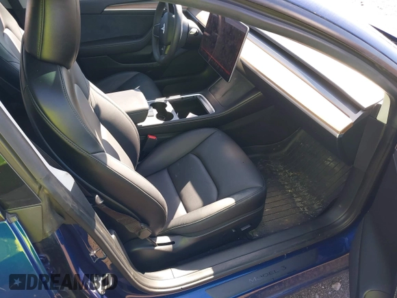 2023 Tesla Model 3 with VIN 5YJ3E1EA2PF690335, listed as a IAAI auction lot 41732701 with 22,238 mi miles and . Bid and sale history available at DreamBid. Image 5.