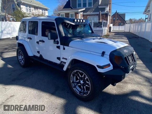 2014 Jeep Wrangler Unlimited Sahara with VIN 1C4BJWEG1EL272951, listed as a Copart auction lot 51147245 with 56,989 mi miles and Clean Title. Bid and sale history available at carsss.com. Image 1.