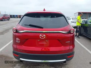 2021 Mazda CX-9 Signature with VIN JM3TCBEY9M0511928, listed as a IAAI auction lot 42231925 with 26,367 mi miles and . Bid and sale history available at DreamBid. Image 16.