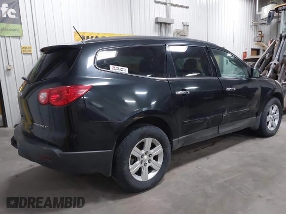 2012 Chevrolet Traverse 1LT z VIN 1GNKVGED8CJ213010, wystawiony jako IAAI lot #41491520 z przebiegiem 185 111 mil mil oraz . Historia ofert i sprzedaży dostępna na DreamBid. Obrazek 4.