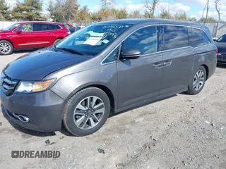 2016 Honda Odyssey Touring Elite with VIN 5FNRL5H90GB128006, listed as a IAAI auction lot 41695438 with 133,337 mi miles. Bid and sale history available at carsss.com. Image 18.
