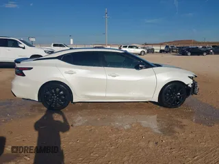 2020 Nissan Maxima SR with VIN 1N4AA6EVXLC365710, listed as a IAAI auction lot 40969464 with 74,320 mi miles and . Bid and sale history available at DreamBid. Image 13.