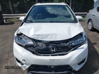 2016 Honda Fit EX z VIN JHMGK5H78GX014803, wystawiony jako IAAI lot #42539208 z przebiegiem 79 433 mil mil oraz . Historia ofert i sprzedaży dostępna na DreamBid. Obrazek 12.