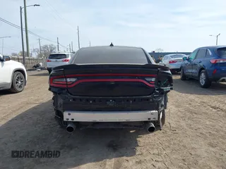 2020 Dodge Charger R/T with VIN 2C3CDXCTXLH145129, listed as a IAAI auction lot 41769766 with 56,213 mi miles and . Bid and sale history available at carsss.com. Image 17.