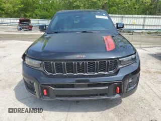 2022 Jeep Grand Cherokee Trailhawk with VIN 1C4RJHCG7N8574289, listed as a Copart auction lot 56333165 with 23,522 mi miles and Salvage title. Bid and sale history available at DreamBid. Image 5.