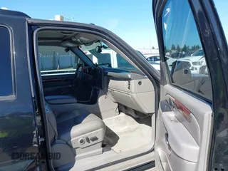 2004 Cadillac Escalade z VIN 1GYEC63T94R235191, wystawiony jako IAAI lot #42314704 z przebiegiem 164 935 mil mil oraz . Historia ofert i sprzedaży dostępna na DreamBid. Obrazek 5.