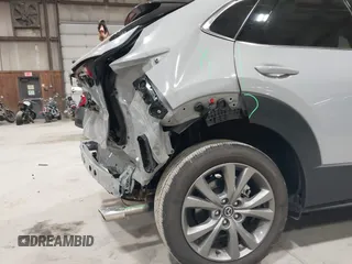 2025 Mazda CX-30 S Premium with VIN 3MVDMBDM5SM788786, listed as a IAAI auction lot 42126428 with 1,370 mi miles and . Bid and sale history available at DreamBid. Image 6.