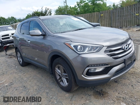 2018 Hyundai Santa Fe 2.4L z VIN 5NMZUDLB4JH073857, wystawiony jako IAAI lot #42200208 z przebiegiem 127 038 mil mil oraz . Historia ofert i sprzedaży dostępna na DreamBid. Obrazek 1.