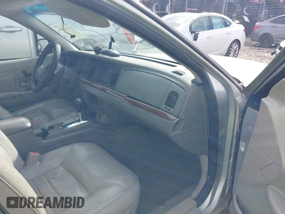 2002 Ford Crown Victoria LX z VIN 2FAFP74W42X100691, wystawiony jako IAAI lot #41316550 z przebiegiem 193 517 mil mil oraz . Historia ofert i sprzedaży dostępna na DreamBid. Obrazek 5.