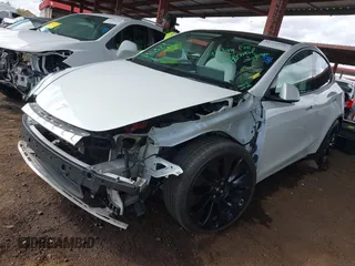 2022 Tesla Model Y Performance with VIN 7SAYGDEF4NF449986, listed as a IAAI auction lot 41754916 with 64,384 mi miles and . Bid and sale history available at DreamBid. Image 20.