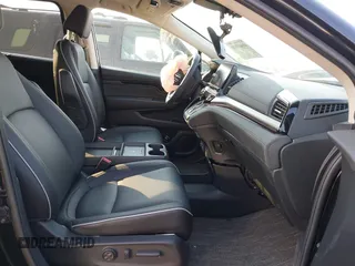 2025 Honda Odyssey Touring with VIN 5FNRL6H81SB011122, listed as a IAAI auction lot 41402170 with 2,968 mi miles and . Bid and sale history available at DreamBid. Image 5.