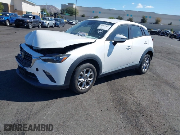 2021 Mazda CX-3 Sport with VIN JM1DKDB75M1500023, listed as a IAAI auction lot 41461424 with 65,162 mi miles. Bid and sale history available at carsss.com. Image 2.
