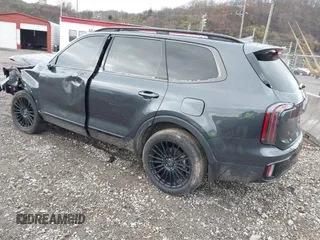 2024 Kia Telluride EX with VIN 5XYP3DGC0RG495708, listed as a IAAI auction lot 40970095 with 7,135 mi miles and . Bid and sale history available at carsss.com. Image 3.