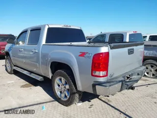 2013 GMC Sierra 1500 SLT with VIN 3GTP2WE78DG323280, listed as a IAAI auction lot 41148621 with 143,491 mi miles. Bid and sale history available at carsss.com. Image 3.