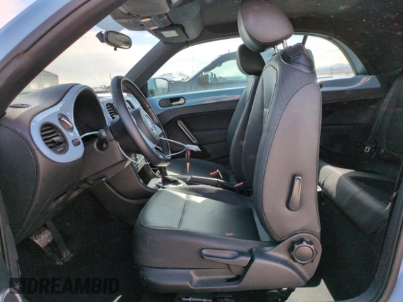 2013 Volkswagen Beetle 2.5L with VIN 3VW5X7AT4DM829494, listed as a Copart auction lot 47654065 with 34,987 mi miles and Salvage title. Bid and sale history available at DreamBid. Image 7.