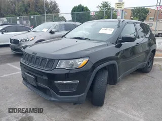 2018 Jeep Compass Sport z VIN 3C4NJCAB2JT250946, wystawiony jako IAAI lot #42444503 z przebiegiem 159 960 mil mil oraz . Historia ofert i sprzedaży dostępna na DreamBid. Obrazek 16.