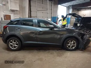 2016 Mazda CX-3 Touring z VIN JM1DKBC77G0107279, wystawiony jako IAAI lot #42235931 z przebiegiem Nie podano mil oraz . Historia ofert i sprzedaży dostępna na DreamBid. Obrazek 13.