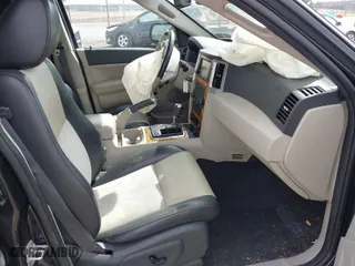 2010 Jeep Grand Cherokee Limited with VIN 1J4RR5GT8AC101758, listed as a IAAI auction lot 41824380 with 118,944 mi miles. Bid and sale history available at carsss.com. Image 5.