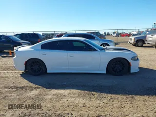 2021 Dodge Charger R/T with VIN 2C3CDXCT4MH588104, listed as a IAAI auction lot 41455312 with 72,162 mi miles and . Bid and sale history available at DreamBid. Image 13.