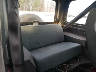 1984 Jeep CJ with VIN 1JCCM87E0ET103859, listed as a Copart auction lot 87461054 with 183,390 mi miles and Salvage Title. Bid and sale history available at carsss.com. Image 10.