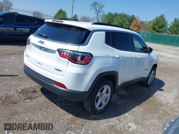 2023 Jeep Compass Latitude with VIN 3C4NJDBN9PT561829, listed as a IAAI auction lot 41994610 with 29,583 mi miles and . Bid and sale history available at DreamBid. Image 4.