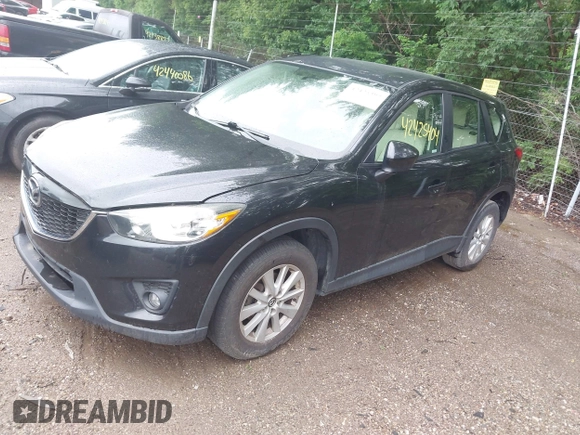 2013 Mazda CX-5 Sport with VIN JM3KE2BE8D0125002, listed as a IAAI auction lot 42425404 with 183,551 mi miles and . Bid and sale history available at DreamBid. Image 2.