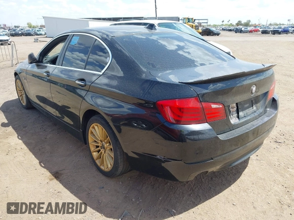 2013 BMW 5 Series 535i xDrive with VIN WBAFU7C51DDU73061, listed as a IAAI auction lot 41960663 with 106,591 mi miles and . Bid and sale history available at carsss.com. Image 3.