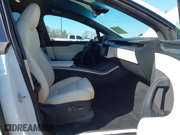 2022 Tesla Model X Plaid z VIN 7SAXCBE64NF352928, wystawiony jako IAAI lot #41406070 z przebiegiem 38 175 mil mil oraz . Historia ofert i sprzedaży dostępna na DreamBid. Obrazek 5.