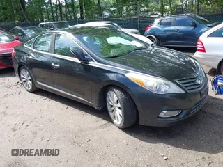 2013 Hyundai Azera z VIN KMHFH4JG9DA330429, wystawiony jako IAAI lot #42315986 z przebiegiem 120 915 mil mil oraz . Historia ofert i sprzedaży dostępna na DreamBid. Obrazek 1.