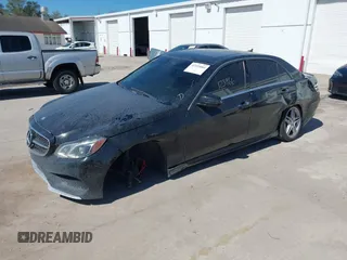 2014 Mercedes-Benz E 350 Sport with VIN WDDHF5KB6EA848341, listed as a IAAI auction lot 41595084 with 123,966 mi miles and . Bid and sale history available at DreamBid. Image 2.