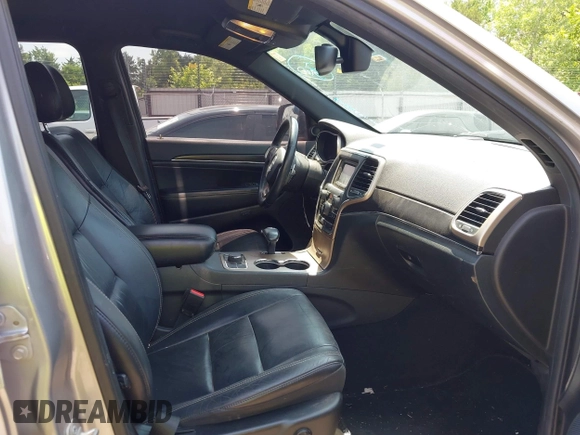 2014 Jeep Grand Cherokee Limited with VIN 1C4RJFBG4EC589321, listed as a IAAI auction lot 42335043 with 153,428 mi miles and . Bid and sale history available at DreamBid. Image 5.