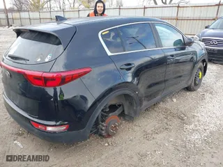 2017 Kia Sportage LX with VIN KNDPM3AC2H7163779, listed as a IAAI auction lot 41662872 with 130,566 mi miles. Bid and sale history available at carsss.com. Image 4.