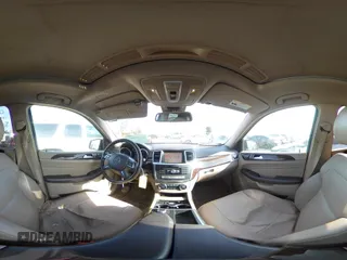 2012 Mercedes-Benz M ML 350 with VIN 4JGDA5HB9CA056210, listed as a IAAI auction lot 41892887 with 178,836 mi miles. Bid and sale history available at carsss.com. Image 18.