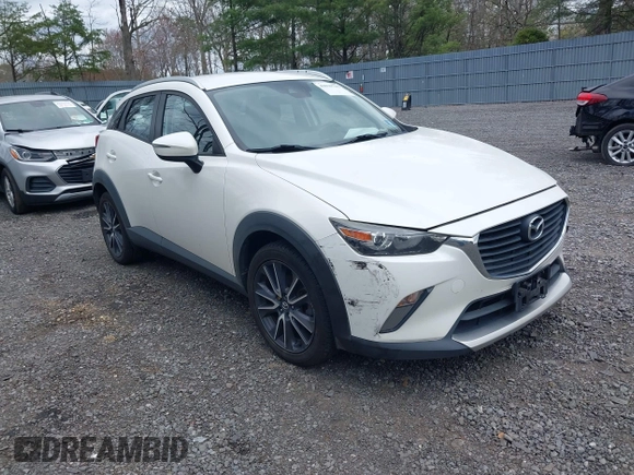 2018 Mazda CX-3 Touring with VIN JM1DKFC71J0315074, listed as a IAAI auction lot 42029790 with 100,268 mi miles. Bid and sale history available at carsss.com. Image 1.