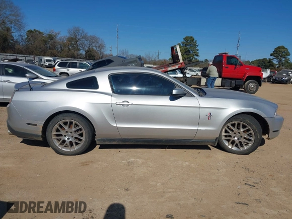 2012 Ford Mustang V6 Premium with VIN 1ZVBP8AM1C5224001, listed as a IAAI auction lot 41385559 with 165,123 mi miles. Bid and sale history available at carsss.com. Image 14.