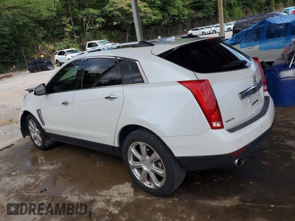 2013 Cadillac SRX Premium Collection with VIN 3GYFNEE30DS529808, listed as a Copart auction lot 61931185 with 131,245 mi miles and Salvage title. Bid and sale history available at DreamBid. Image 2.