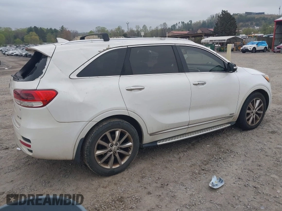 2016 Kia Sorento SX z VIN 5XYPKDA59GG113511, wystawiony jako IAAI lot #41997346 z przebiegiem 140 017 mil mil oraz . Historia ofert i sprzedaży dostępna na DreamBid. Obrazek 4.