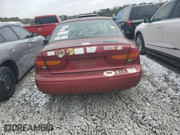 2000 Saturn SL with VIN 1G8ZK5276YZ255844, listed as a Copart auction lot 42003175 with 239,377 mi miles and Salvage title. Bid and sale history available at DreamBid. Image 6.