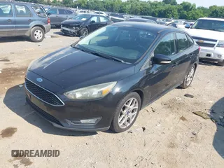 2015 Ford Focus SE z VIN 1FADP3F25FL284097, wystawiony jako IAAI lot #42553323 z przebiegiem 139 647 mil mil oraz . Historia ofert i sprzedaży dostępna na DreamBid. Obrazek 2.