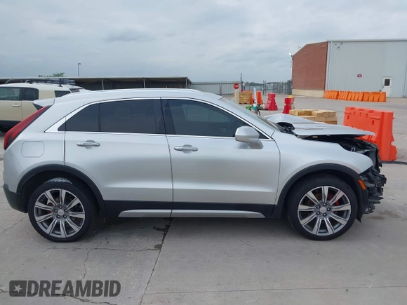 2019 Cadillac XT4 FWD Premium Luxury z VIN 1GYFZCR42KF189610, wystawiony jako IAAI lot #42137690 z przebiegiem 92 502 mil mil oraz . Historia ofert i sprzedaży dostępna na DreamBid. Obrazek 14.