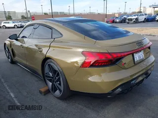 2024 Audi RS e-tron GT z VIN WAUBHBFW5R7900659, wystawiony jako IAAI lot #41797376 z przebiegiem 1010 mil mil oraz . Historia ofert i sprzedaży dostępna na DreamBid. Obrazek 3.