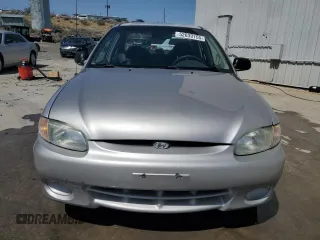 1998 Hyundai Accent z VIN KMHVF24N8WU500040, wystawiony jako Copart lot #52039755 z przebiegiem 103 631 mil mil oraz Szkody całkowita. Historia ofert i sprzedaży dostępna na DreamBid. Obrazek 5.