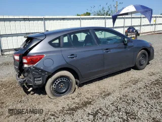 2019 Subaru Impreza with VIN 4S3GTAA62K3750807, listed as a Copart auction lot 61578465 with 48,820 mi miles and Salvage title. Bid and sale history available at DreamBid. Image 3.